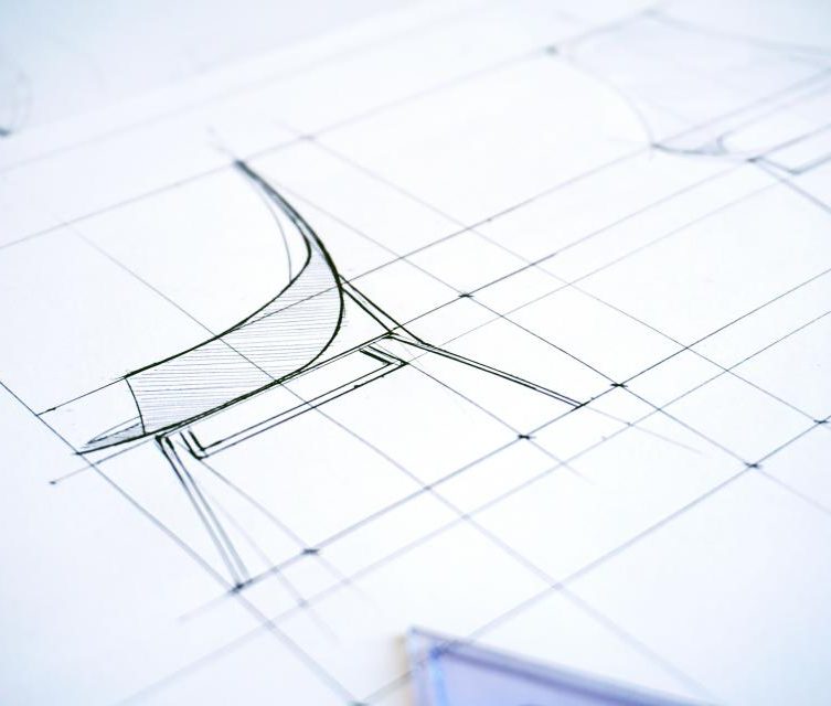 A hand-drawn building sketch on a plan sheet
